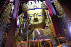 
The most impressive Tashilhunpo sight is the Maitreya Chapel, a tall red building with a gold roof at the complex’s northwestern corner, built in 1914 by the ninth Panchen Lama. It houses a 26.2m image of Maitreya, the Future Buddha, whose ears are 2.6m long and each finger 1.2m. The statue contains 279kg of gold and 150,000kg of copper and brass molded on a wooden frame.
